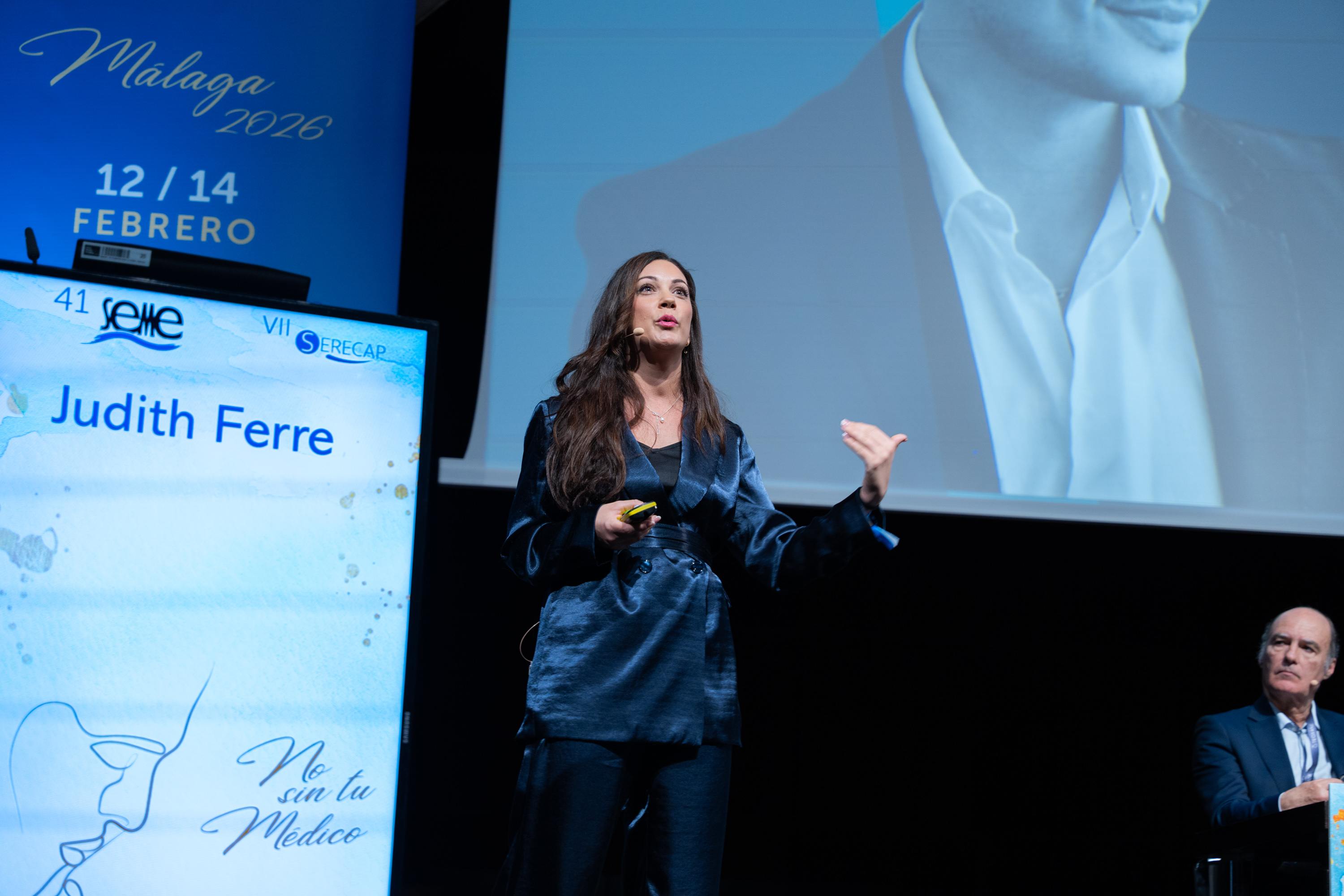 Dra. Judith Ferré speaking on stage at the SEME aesthetic medicine congress, Málaga 2026.